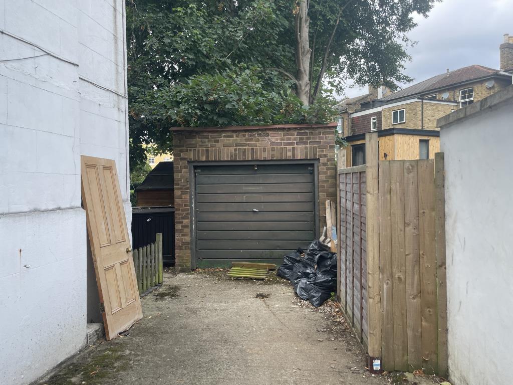 Lot: 11 - GARAGE WITH FORECOURT CLOSE TO TOWN CENTRE - view of vacant garage